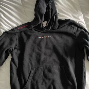 Black Pullover Hoodie with Small Multicolor Chest Text